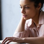 Woman looking at computer